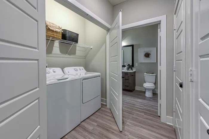 two bedroom model laundry room Encore Apartments Belton MO