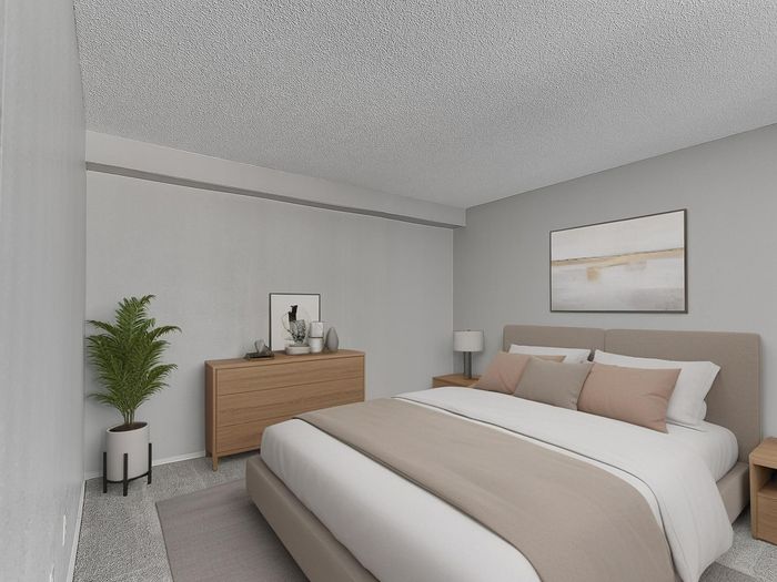 Luxurious bedroom with a plush bed, elegant decor, and modern furnishings exuding comfort and style.