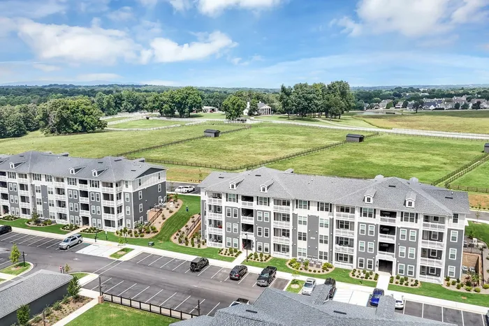 Daytime Apartment Building Aerial Shot