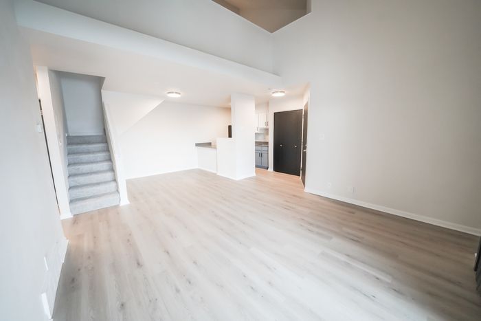 View of Living Room & Stairs