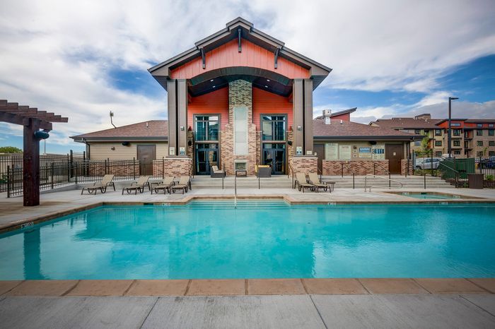 Apartments For Rent In Sandy, UT - Dry Creek - Sparkling Swimming Pool With A Hot Tub, Lounge Chairs, And A Gazebo