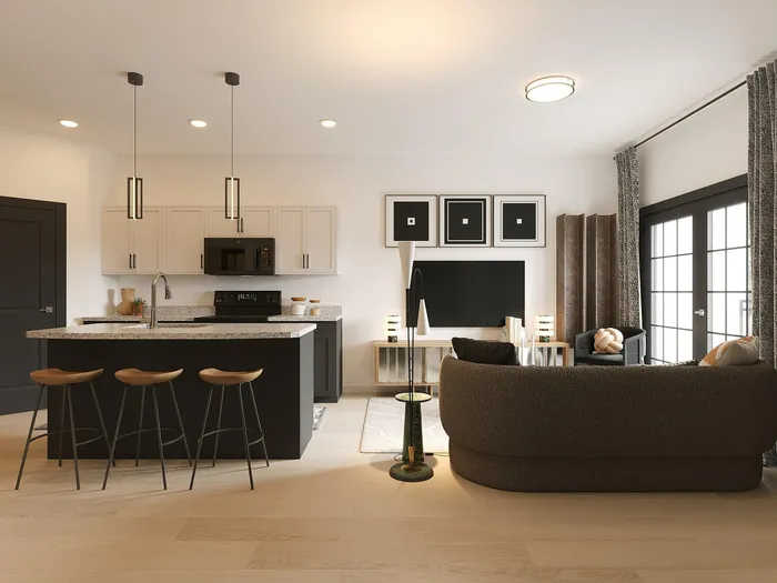 Chic open-concept living room and kitchen with stylish pendant lighting, modern appliances, and cozy seating for a welcoming ambiance.