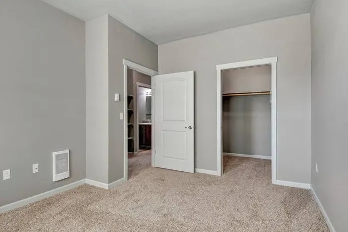 Beautiful Primary Bedroom | Apartments in Tualatin, OR | River Ridge