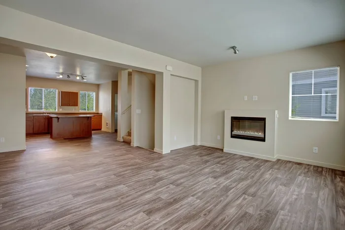 Living Room with Wood-Inspired Flooring | Apartments in Puyallup WA | Brookstone at Edgewater
