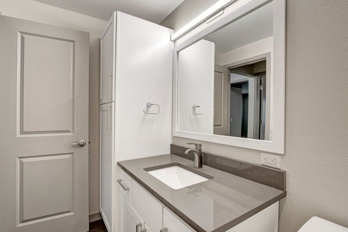 Bathroom with Built-In Linen Closet | Apartments in Everett | Charter Club