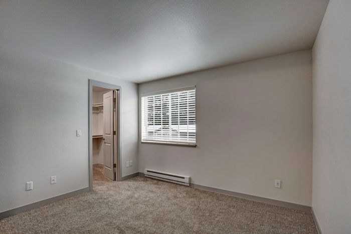 Bedroom with Large Windows for Natural Light | Everett Washington Apartments | Charter Club