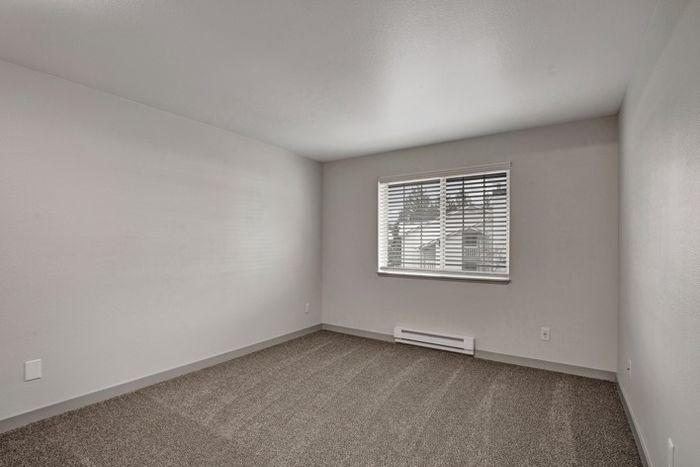 Bedroom with Large Windows for Natural Light | Everett Washington Apartments | Charter Club