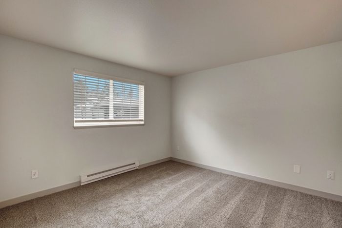 Bedroom with Large Windows for Natural Light | Everett Washington Apartments | Charter Club