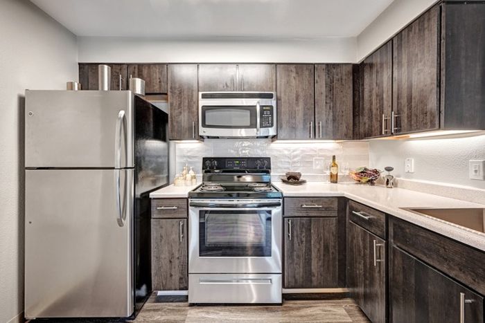 Open Kitchen with Stainless and Black Appliances | Littleton Colorado Apartments | Summit Riverside