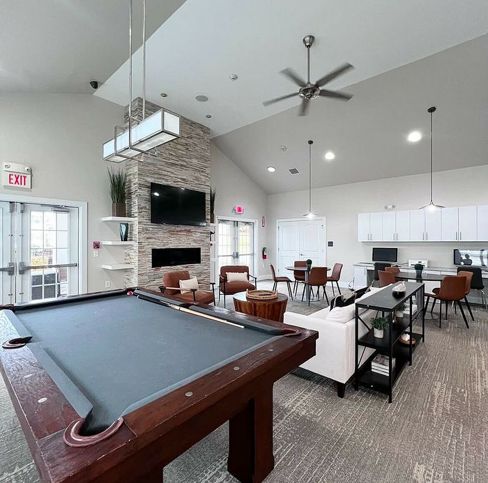 2-Bedroom Garden-Style Apartments In Sayreville, NJ - Morgan's Buff - Community Clubhouse With A Pool Table, Lounge Area, Business Center, And TV