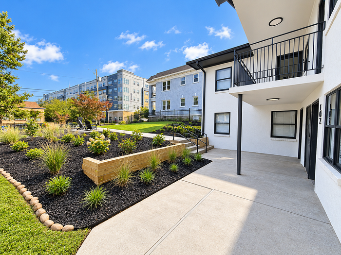 Patio space and renovated lawn.