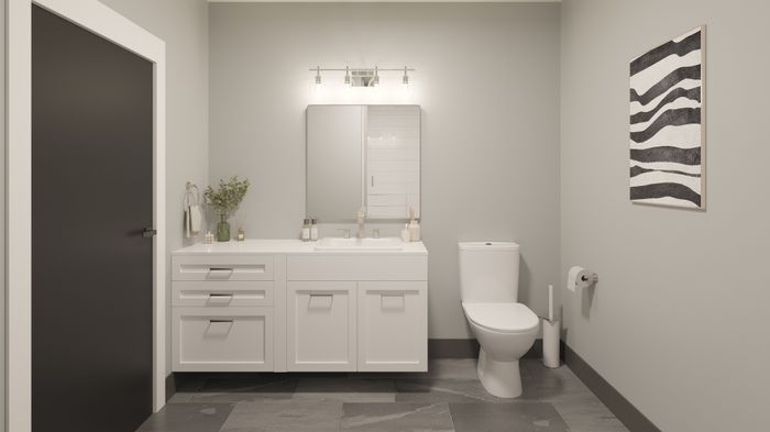 Modern bathroom with sleek white vanity, large mirror, and contemporary art on the wall, exuding sophistication and style.
