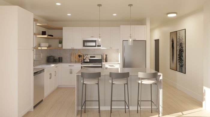 Sleek modern kitchen with elegant pendant lighting, a spacious island with seating, and stylish open shelving.