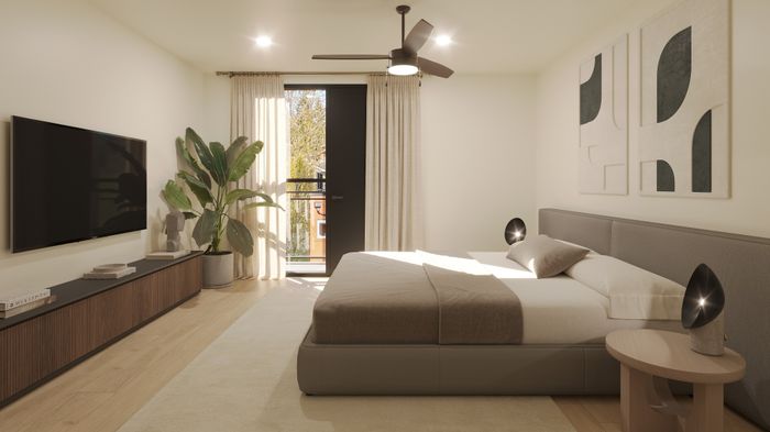 Elegant bedroom with modern decor, featuring a sleek gray bed, stylish artwork, and a large window for natural light. Includes a cozy wooden side table and a flat-screen TV for ultimate comfort and relaxation.
