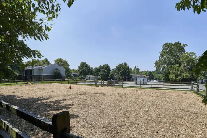 Pet-Friendly Apartments in Millersville, PA - Millers Crossing Apartments - Dog Park with a Fence Around It