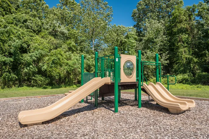 Outdoor playground area at Apartments at Bel Air.