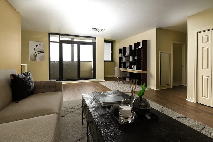 One-Bedroom Apartments in Pittsburgh, PA - Apartments at River View - Living Room with Natural Lighting, and Wood-Style, and an Open Floor Plan