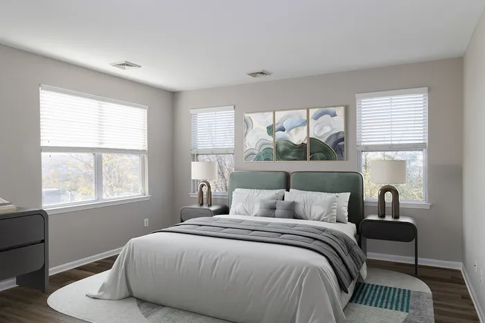 Dog-Friendly Apartments in Plymouth Meeting, PA - Plymouth Pointe - Kitchen with Stainless Steel Appliances, White Cabinets with Grey-Granite Countertops, and Wood-Style Plank Flooring