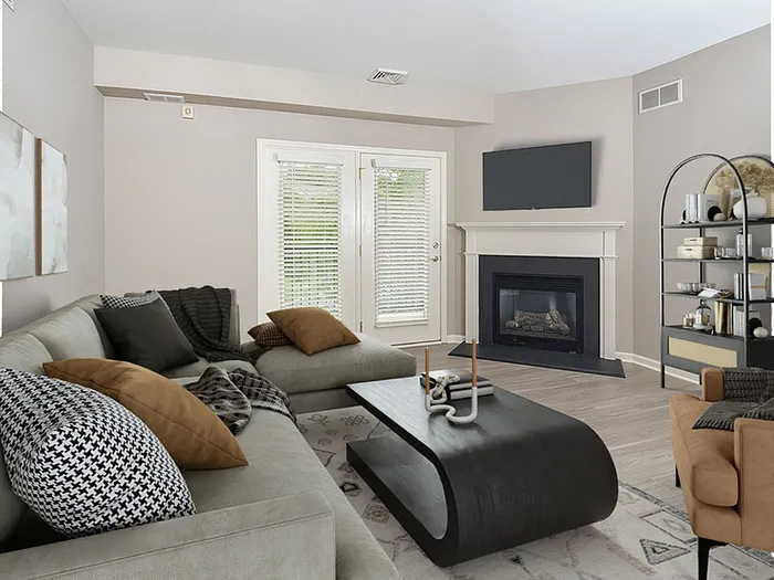 Dog-Friendly Apartments in Plymouth Meeting, PA - Plymouth Pointe - Kitchen with Stainless Steel Appliances, White Cabinets with Grey-Granite Countertops, and Wood-Style Plank Flooring