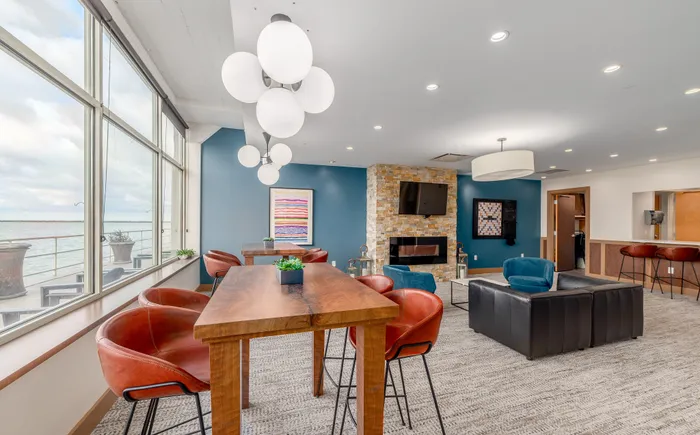 Resident lounge offering stunning waterfront views