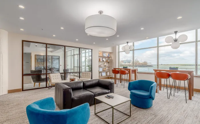 Resident lounge offering stunning waterfront views