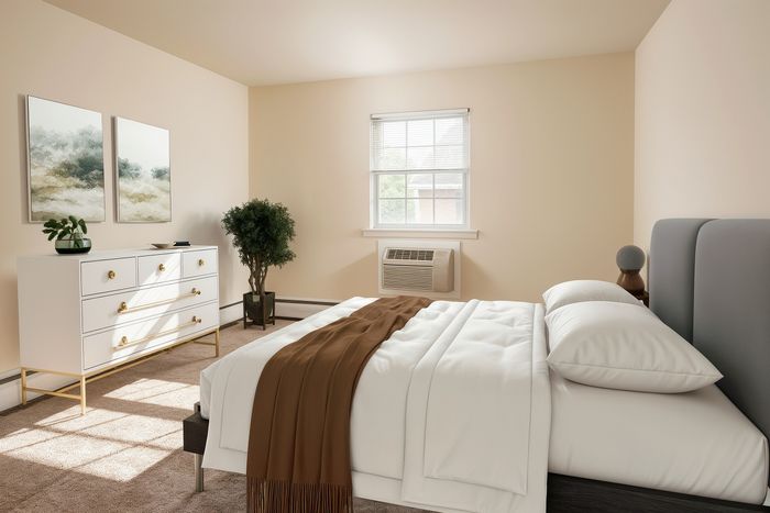 Bright and inviting bedroom with elegant decor, featuring a cozy double bed, modern white dresser, lush green plant, and soft natural light filtering through the window.