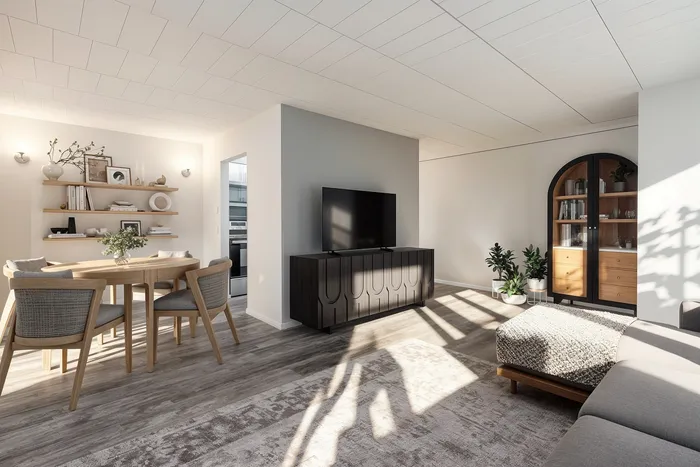 Bright and inviting open-concept living area with a stylish dining set, modern TV unit, and elegant shelving, perfect for entertaining.