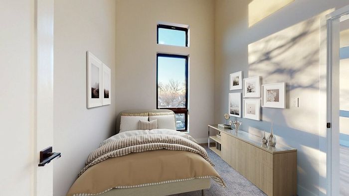 One-bedroom apartment in Denver with high ceilings, large windows, and plenty of natural light, close to sporting events and downtown restaurants.