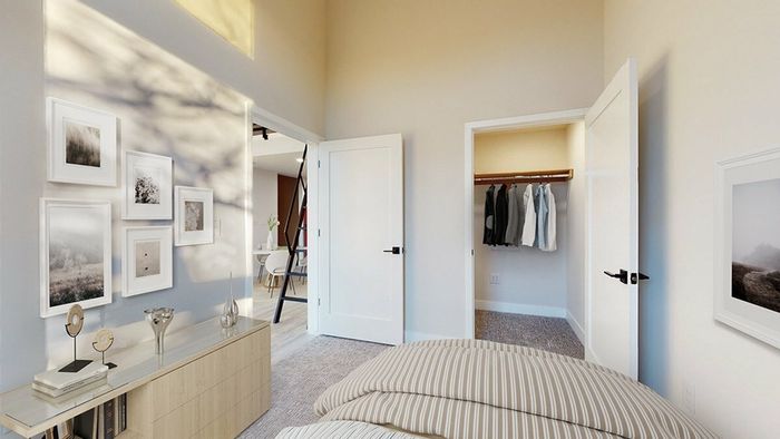 One-bedroom Denver apartment with a spacious closet, modern finishes, and easy access to the cozy living room, perfect for pet owners.