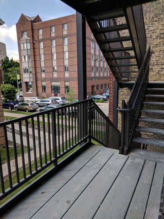 Centro Apartments Porch - Schulhof Property Management LLC
