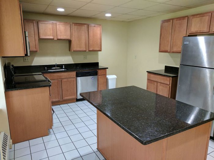 Centro Apartments Kitchen - Schulhof Property Management LLC