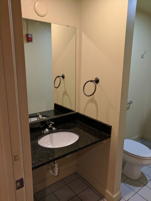 Centro Apartments Bathroom - Schulhof Property Management LLC