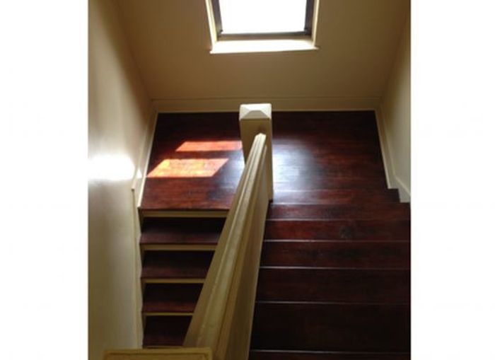Centro Apartments Staircase - Schulhof Property Management LLC