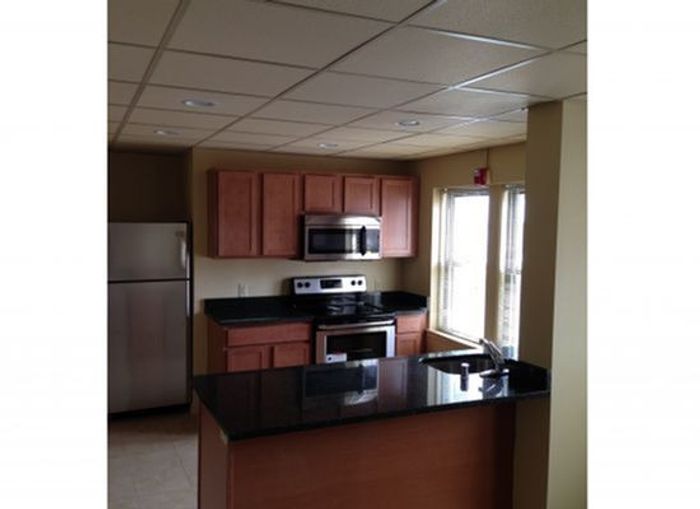 Centro Apartments Kitchen - Schulhof Property Management LLC