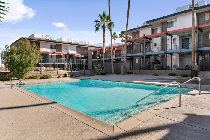 Clean and inviting pool area perfect for relaxing in the sun.