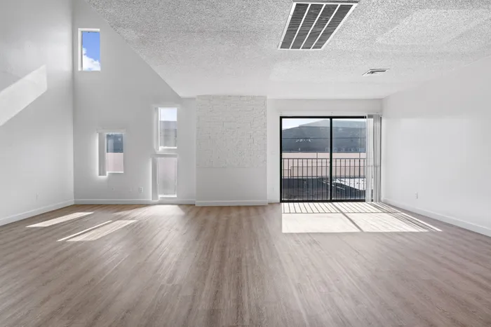 Big living room with stylish, quality flooring.