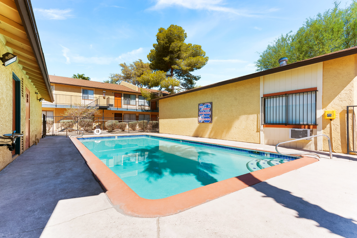 Well-maintained pool area that is perfect for relaxing.