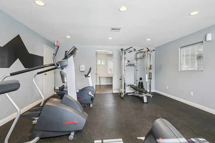Modern fitness center featuring high-quality exercise machines and a clean, inviting atmosphere.