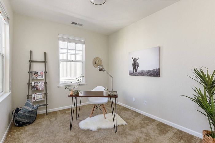 Bedroom staged as an office space.