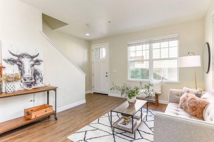 Cozy living room with couch and coffee table.