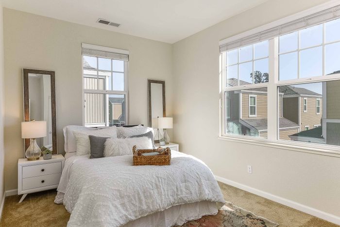 Bedroom with large windows