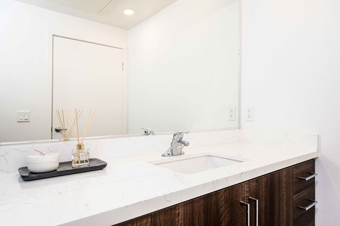 bathroom vanity with quartz countertop at arte west apartments