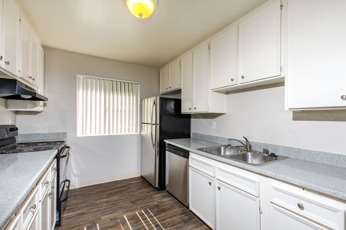 kitchen with white cabinets and stainless steel appliances