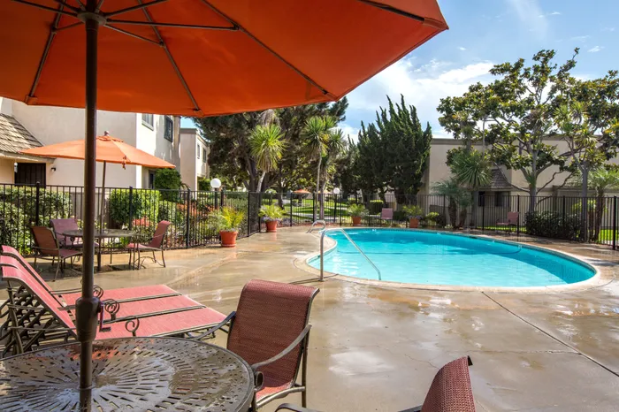 pool with shaded seating