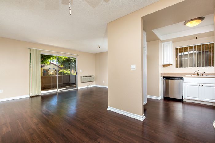 kitchen and living area with sliding door to outdoor patio