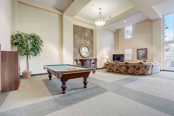 Spacious clubhouse with billiards table