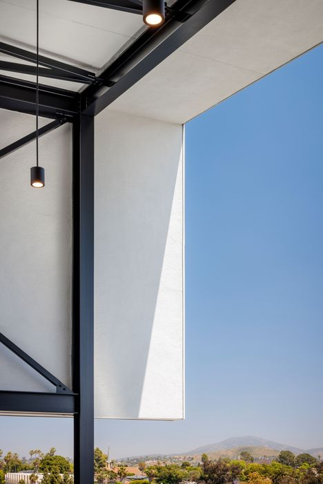 Close-up of rooftop overhand on the rooftop lounge at Kelvin Apartments featuring panoramic views