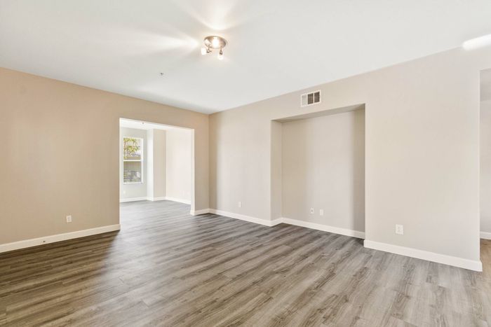 open living room with hardwood like flooring