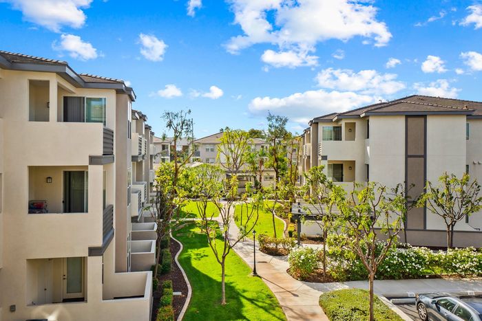 view of apartment community from a third story patio