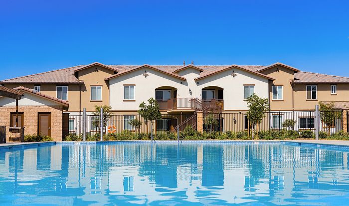 pool and apartment buildings at Grapevine Villa